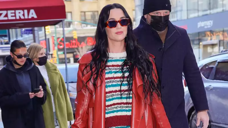 Katy Perry wearing red leather with a border knit in New York