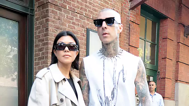 Kourtney Kardashian and Travis Barker are considering a "destination wedding," sources say.