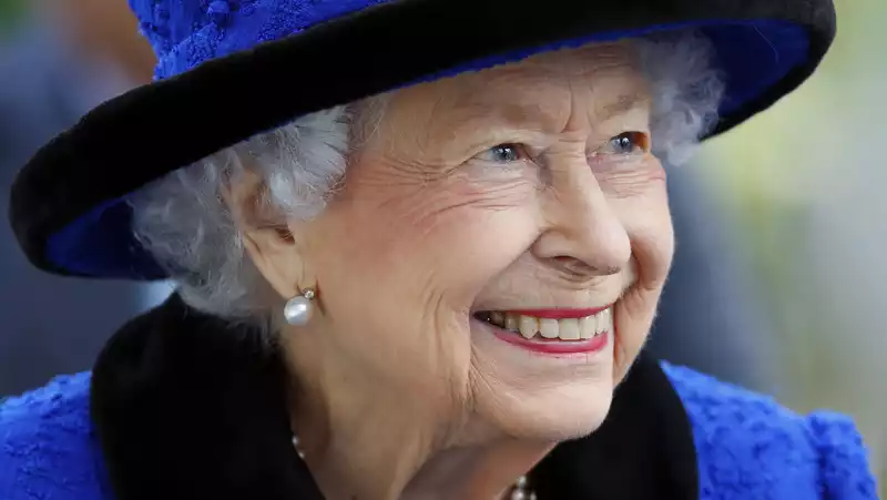 Queen cancels latest trip, spends night in hospital