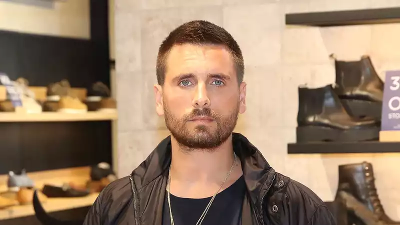 Scott Disick, who apparently "refuses to be in the same room" with Travis Barker.