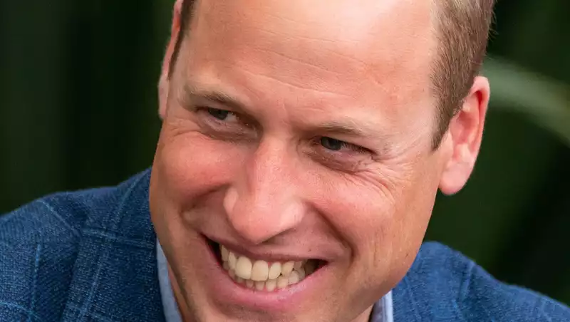 Prince William reveals adorable family photo that hangs in his office.