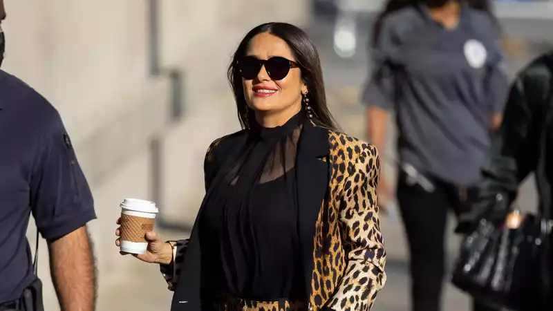 Salma Hayek looking super hot in a leopard print suit