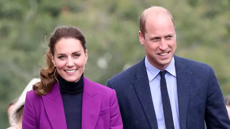 Kate Middleton happily holds a tarantula named Charlotte.