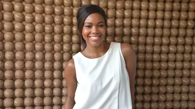 Gabrielle Union, topless dancing in front of a window: "Actually free."