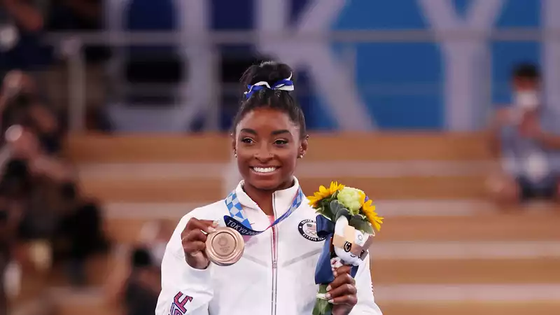 Simone Biles' tropical vacation photos are the definition of dreamy.