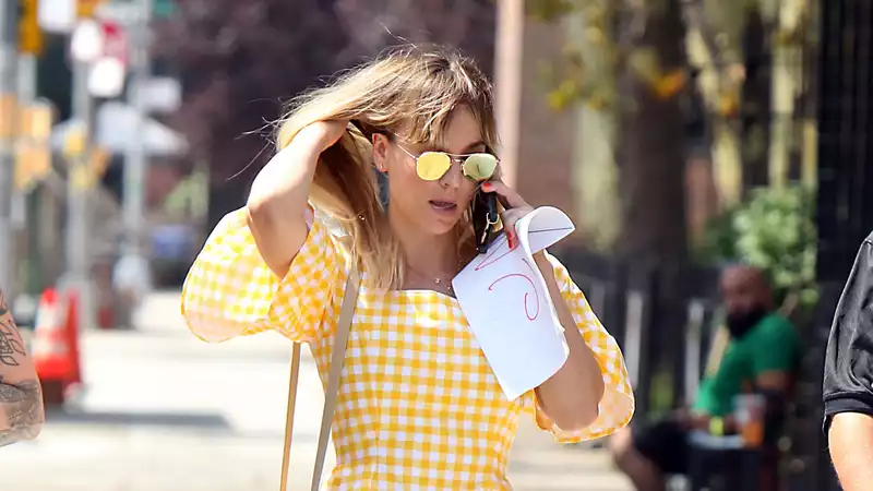 Kaley Cuoco stuns in a yellow gingham sundress