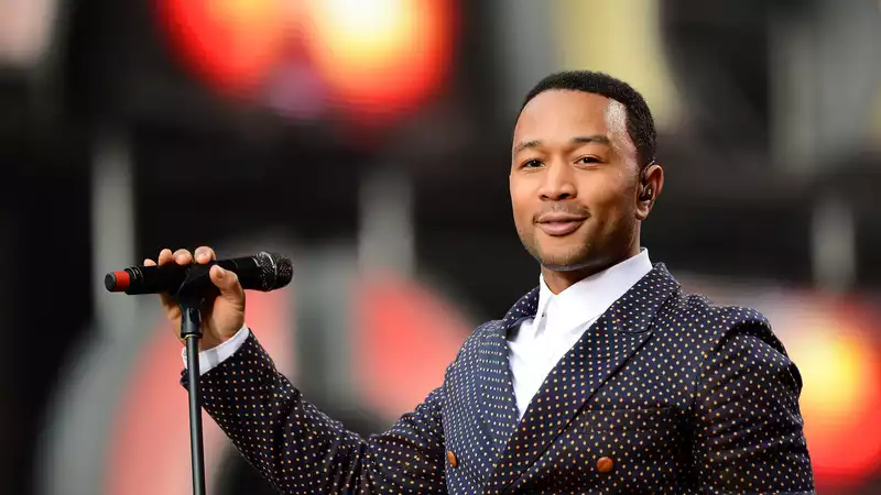 John Legend sings "Imagine" with artists from around the world at the Opening Ceremony of the Olympics.