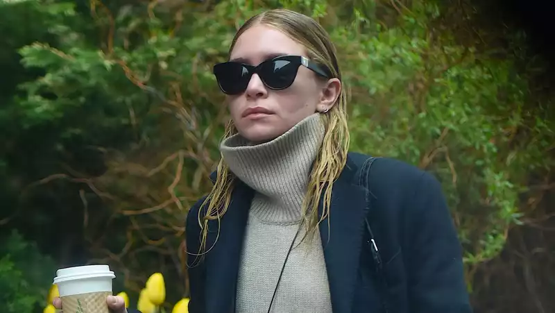 Ashley Olsen's boyfriend shares a rare photo of her hiking in the woods.