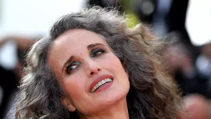 Andie MacDowell transforms into Gray at Cannes.