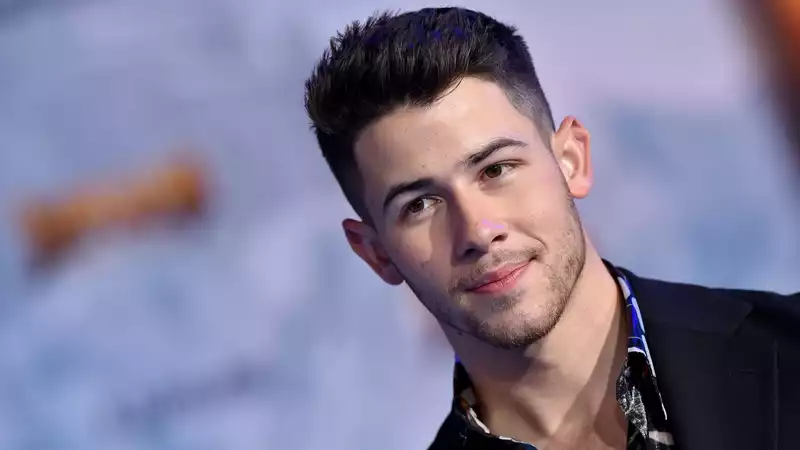 Nick Jonas Surprises Fans with Jonas Brothers T-Shirt