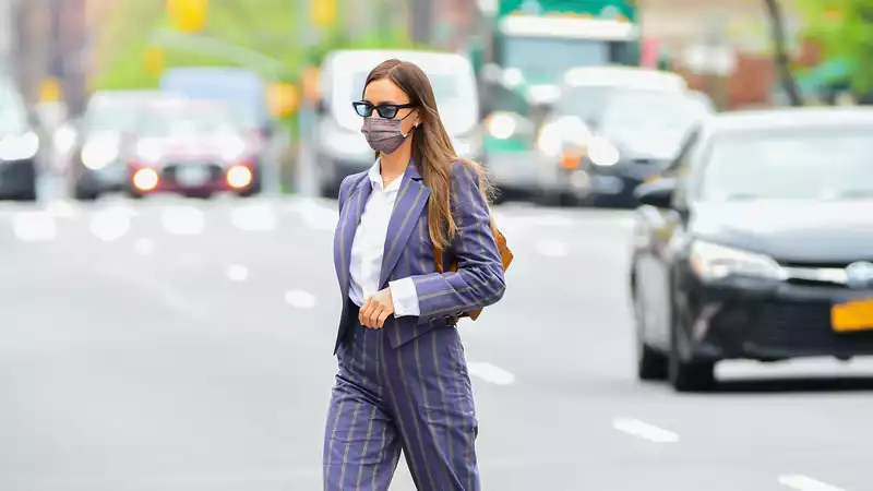 Irina Shayk wearing a Vivienne Westwood suit and Dr. Martens in New York