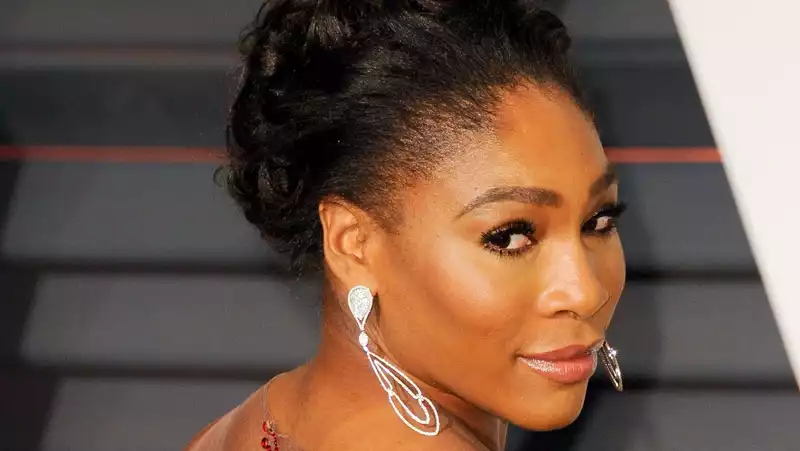 Serena Williams stuns in the most glamorous feather-trimmed robe