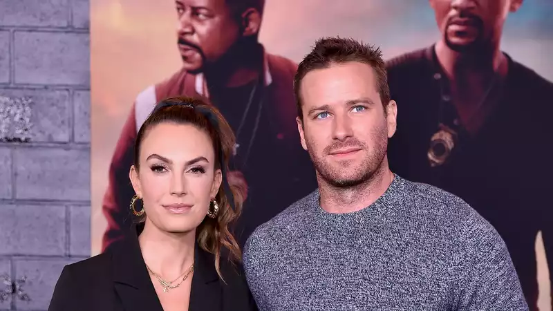 Elizabeth Chambers talks about her ex-husband Armie Hammer's social networking scandal.