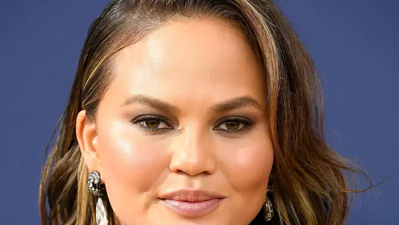 Chrissy Teigen celebrates with her first shower since losing her son Jack.