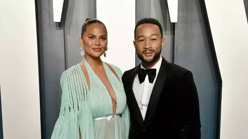 John Legend pays emotional tribute to Chrissy Teigen after the loss of her baby.