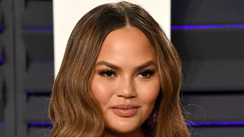 Chrissy Teigen undergoes two blood transfusions at the hospital due to pregnancy complications.