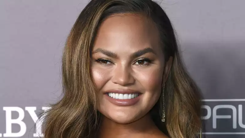 Chrissy Teigen shows off her growing baby in new Instagram video