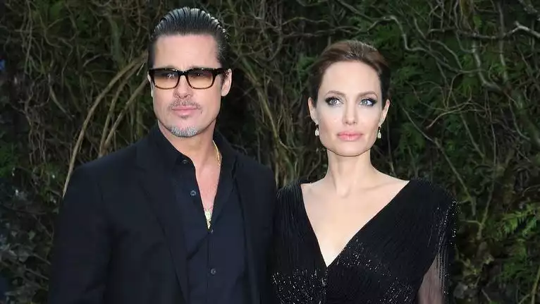 Brad Pitt accuses Angelina Jolie of stalling divorce talks.