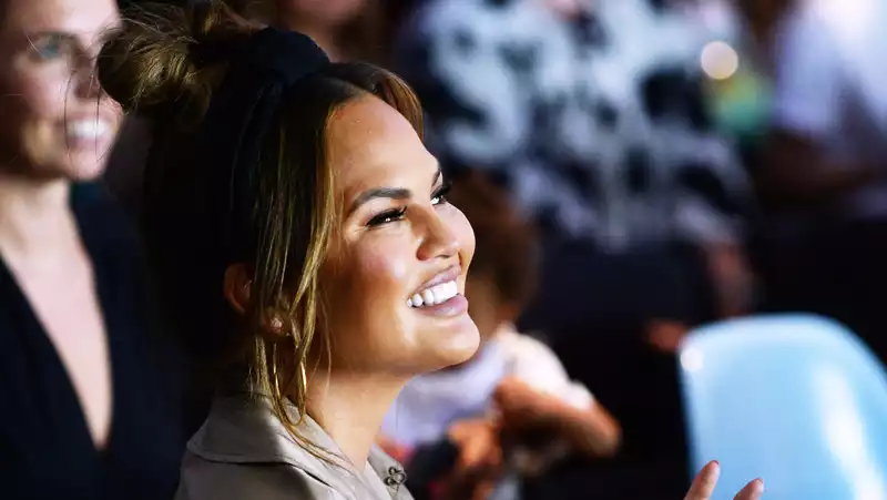 Chrissy Teigen and her assistant created a "cheerleading" inspired workout video.