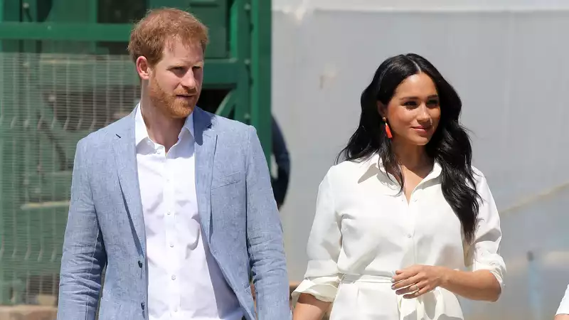 Meghan Markle in a $76 White Magic Linen Sundress with Prince Harry in LA