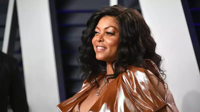 Taraji P. Henson proudly shows off her red afro.