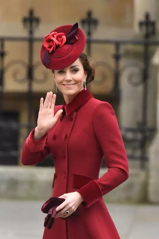 Kate Middleton attends Commonwealth Day service in a bold red coat.