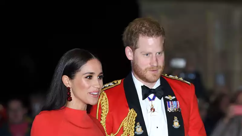 Harry and Meghan Markle receive a standing ovation at the Mountbatten Music Festival