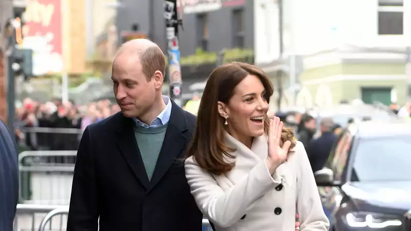 Prince William breaks royal protocol and takes a selfie with a fan in Ireland.