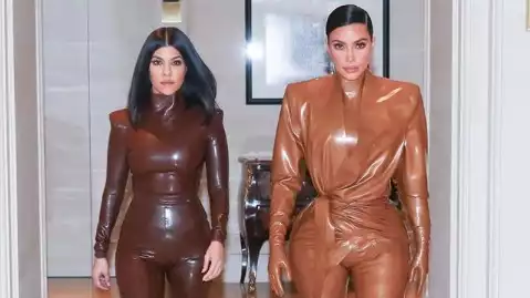 Kim and Kourtney Kardashian Wear Matching Latex at Paris Fashion Week