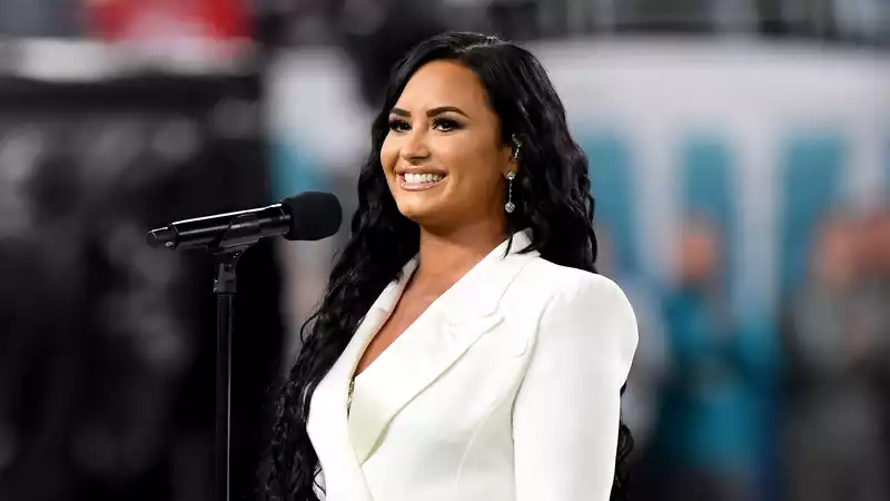 Demi Lovato celebrates her freckles and "boob chin" in a no-makeup selfie