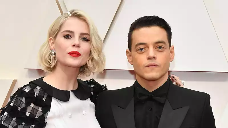 Rami Malek and Lucy Boynton in monochrome at the Academy Awards ceremony.