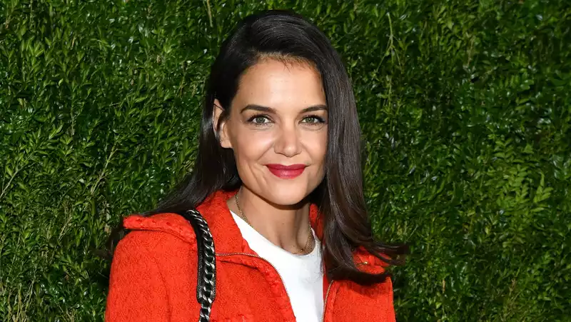 Katie Holmes stuns in an oversized white coat from Wardrobe.NYC