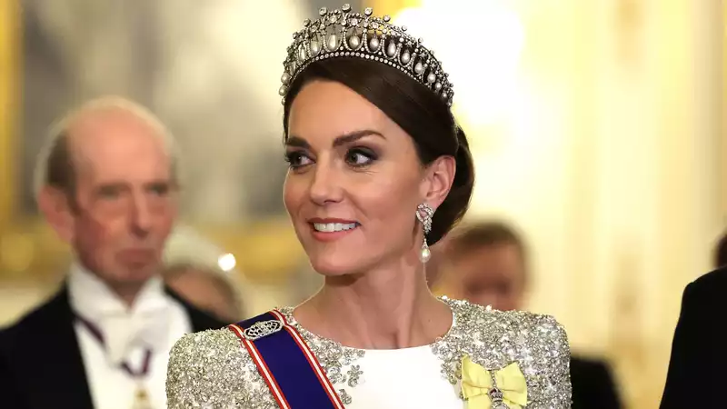 Kate Middleton looks like a fairy-tale princess in a tiara and bedazzled dress for King Charles' first state dinner.