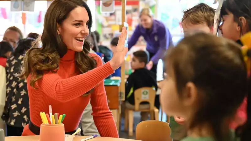 Princess Kate brightens up a cold January with an orange sweater set from Gabriela Hearst.