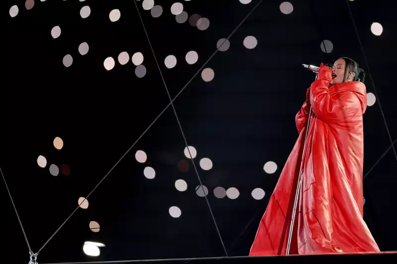 Rihanna pays tribute to friend Andre Leon Talley with Super Bowl red coat