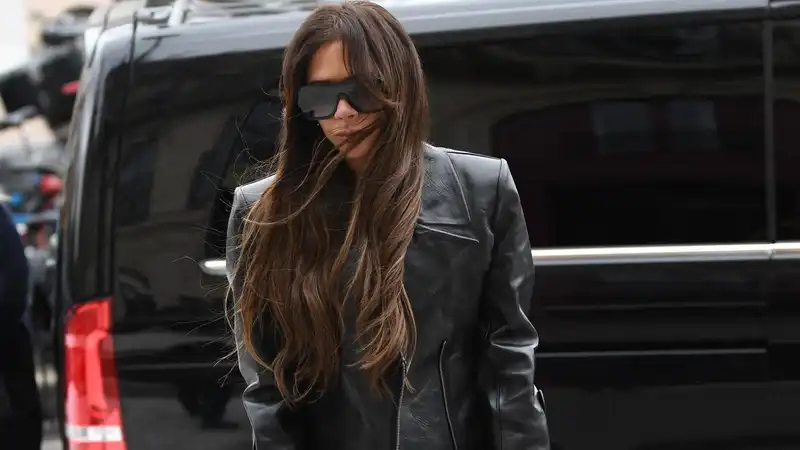 The Victoria Beckham Edge Biker jacket perfectly complemented her crutches.