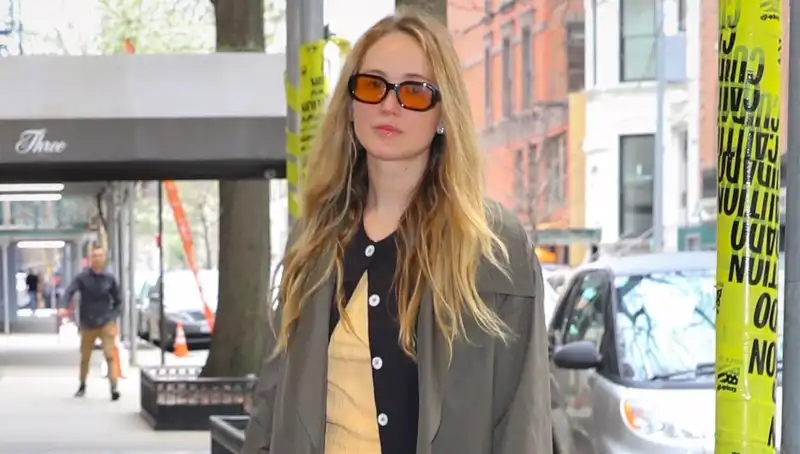 Jennifer Lawrence turns neutral uniforms into butter yellow trend