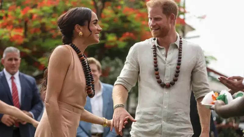 Prince Harry and Meghan Markle arrive in Nigeria after a brief reunion in London.