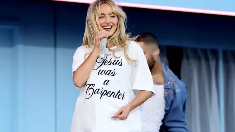 Sabrina Carpenter at the Met Gala after-party with a Peppa Pig Band-Aid.