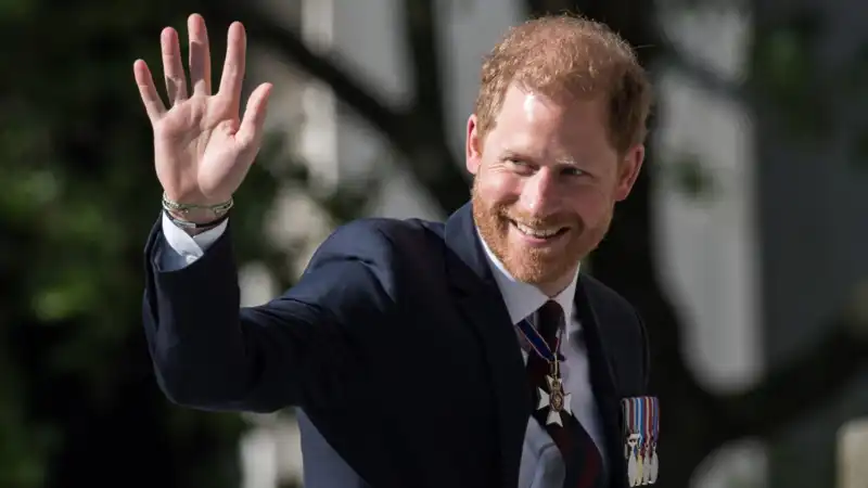 Prince Harry arrives at St. Paul's Cathedral to loud cheers