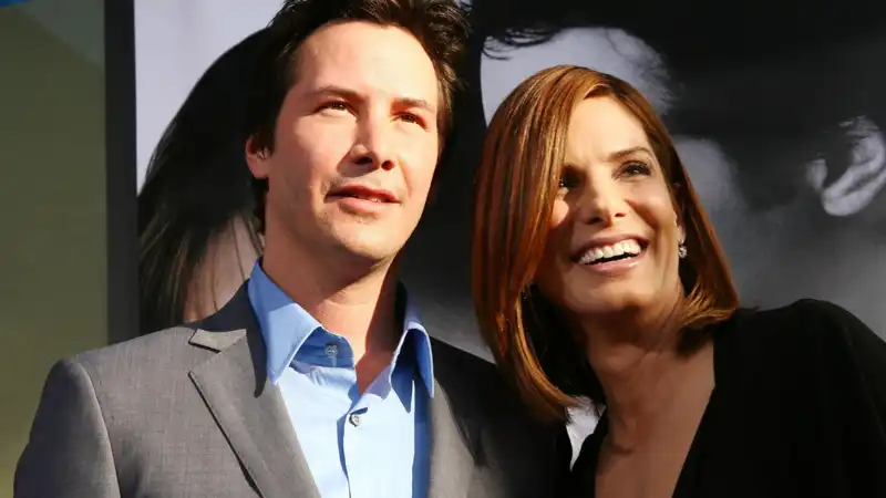 Sandra Bullock wants to work with Keanu Reeves again "before I die."