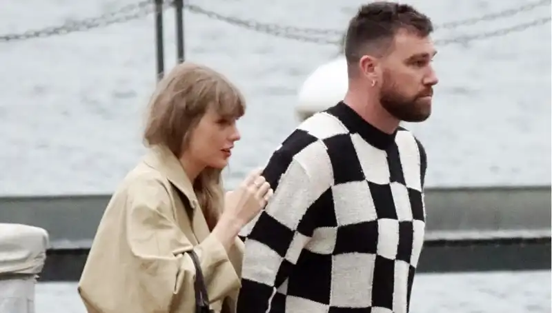 Taylor Swift dresses up for a romantic Lake Como date in a trench coat with timeless LBD