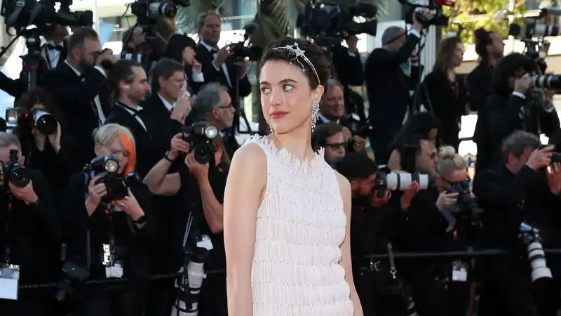 Margaret Qualley brings a Bedzled headband to the red carpet of Cannes