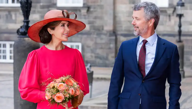 The costume of Queen Mary of Denmark is repeated in a hot pink dress filled with the history of royal fashion