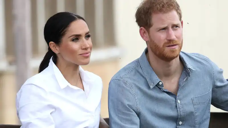 Meghan Markle "went ahead" from royal drama, royal author says, but Prince Harry is "still brooding in the past