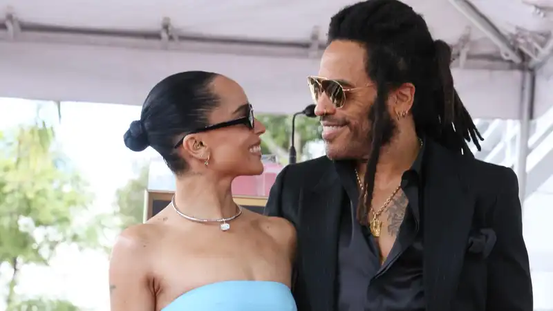 Lenny Kravitz slips when his daughters Zou Kravitz and Channing Tatum tie the knot and whether he will perform at the wedding.