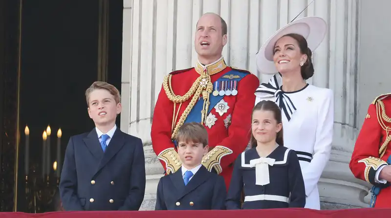 The sun shone as the Royal Band played "Over the Rainbow," a fitting return for Kate Middleton in "Trooping the Colour," despite the pouring rain.