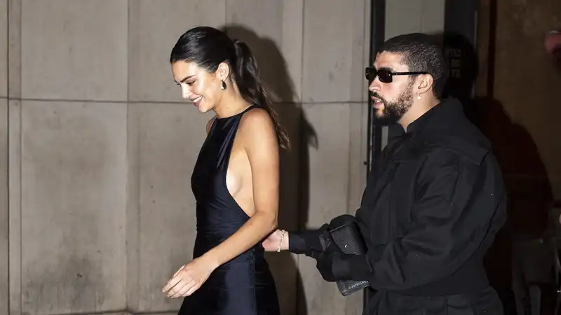 Kendall Jenner coordinates her Paris date with her bad bunny in a semi-sheer little black dress.