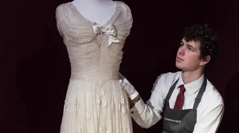 Bridesmaid dress worn at the late Queen Elizabeth's 1947 wedding sells for $48,420