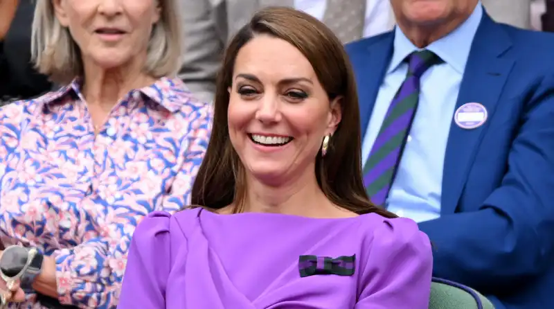 Princess Kate makes a surprise appearance at Wimbledon, wearing a purple Safiya dress endorsed by the British Royal Family.